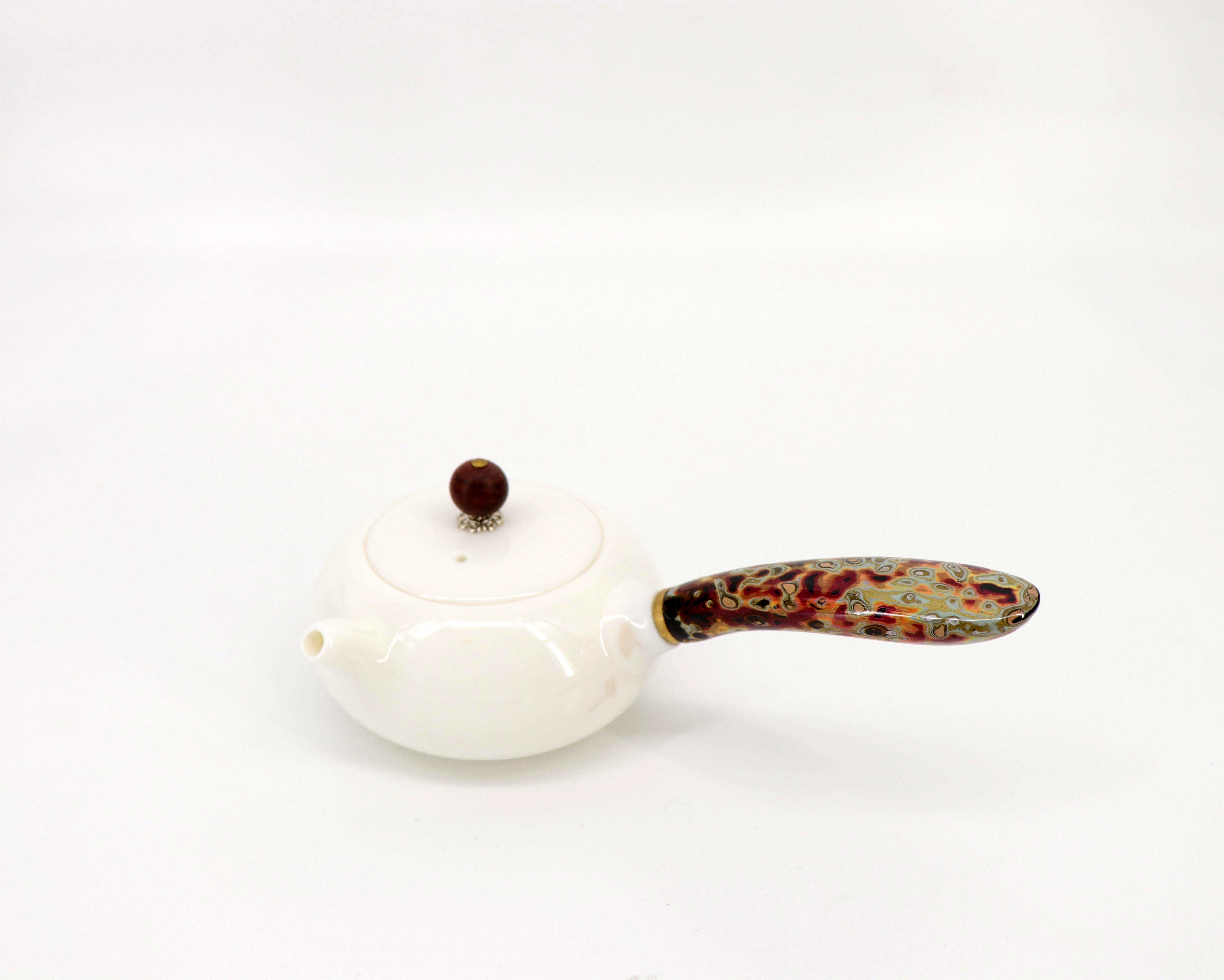 犀皮漆器侧把壶
